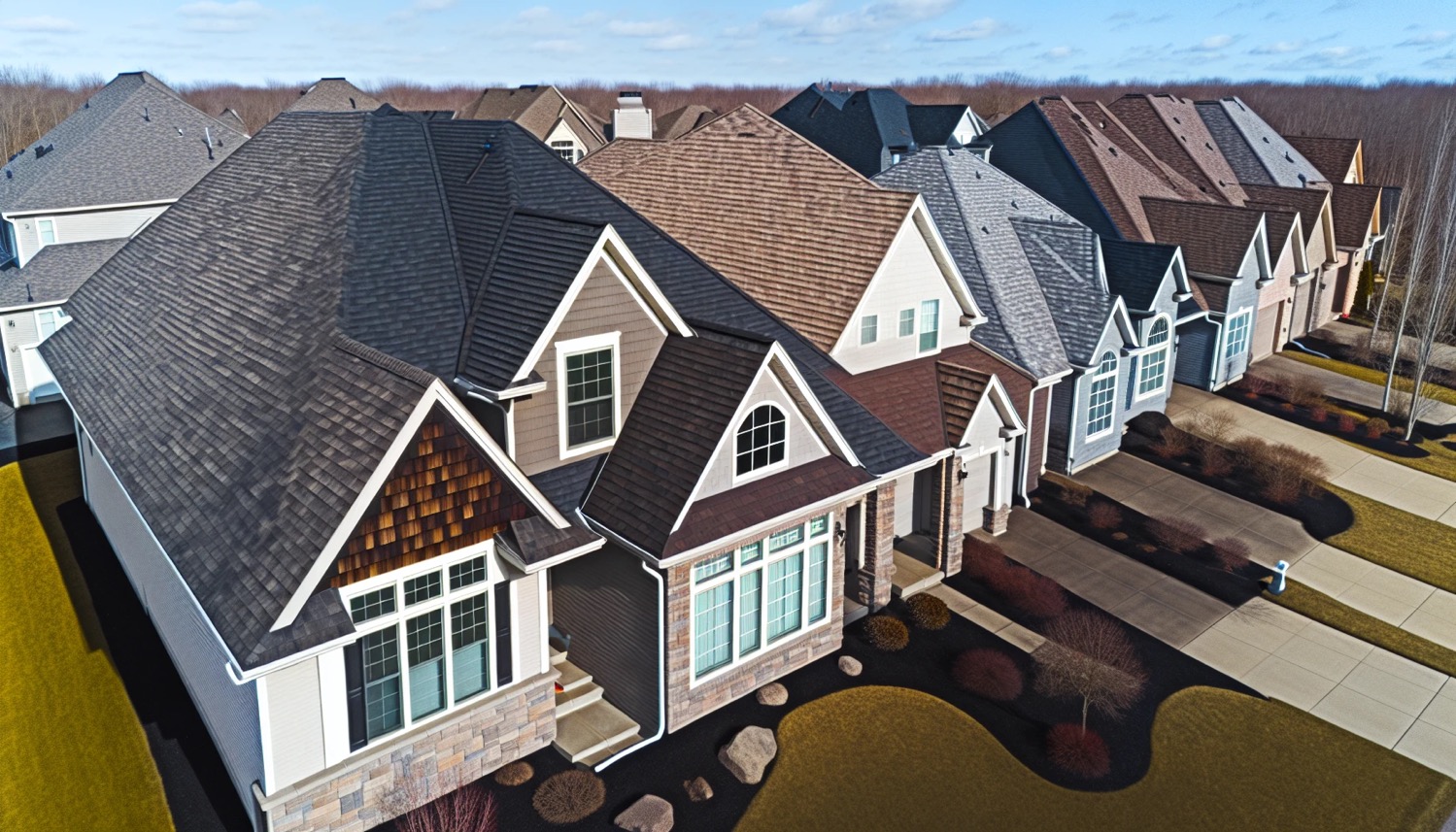 A variety of roofing shingle colors displayed on a house showcasing popular options like weathered wood dark brown and dark gray