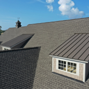 Illustration of a roof cricket being inspected and cleaned