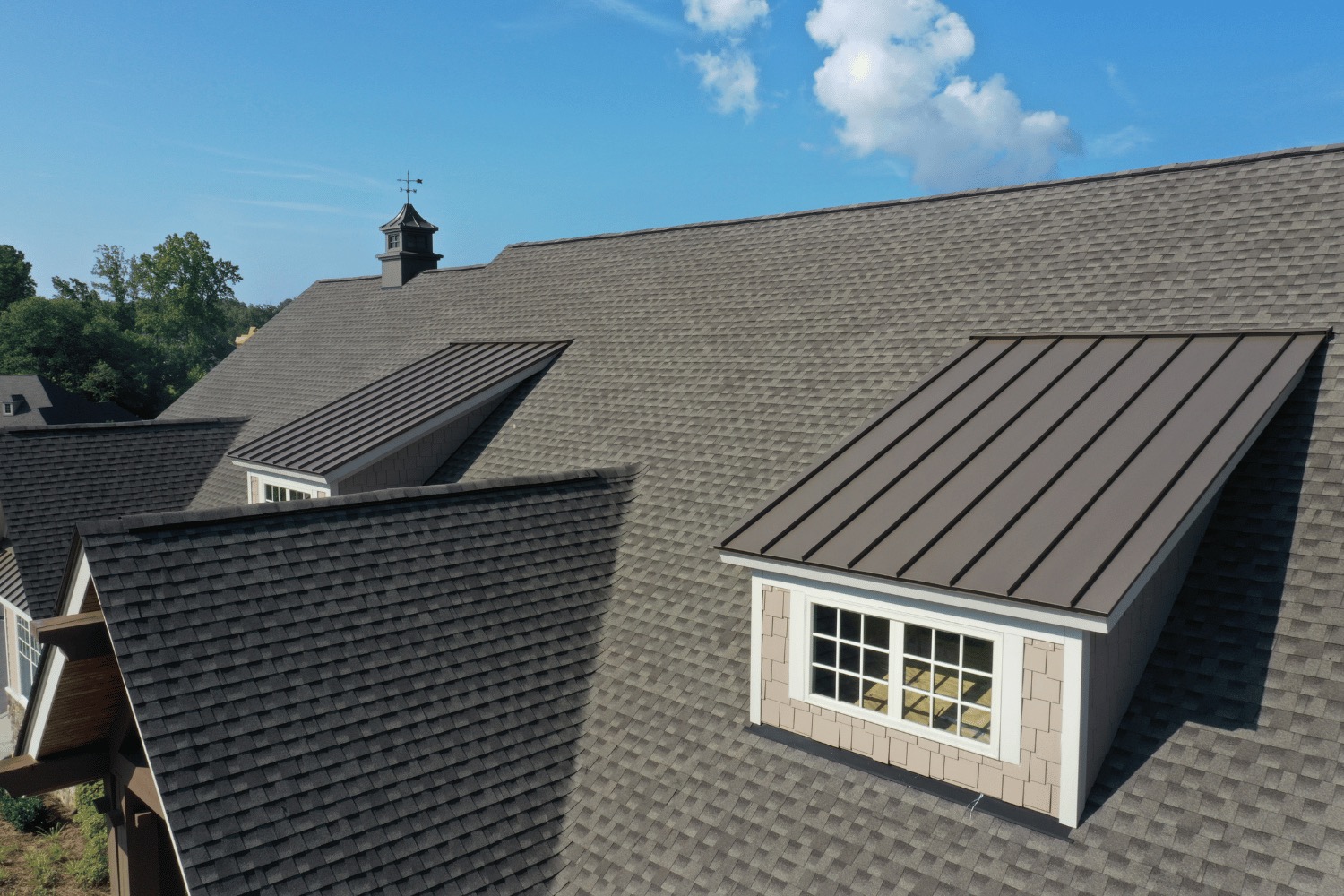 Illustration of a roof cricket being inspected and cleaned