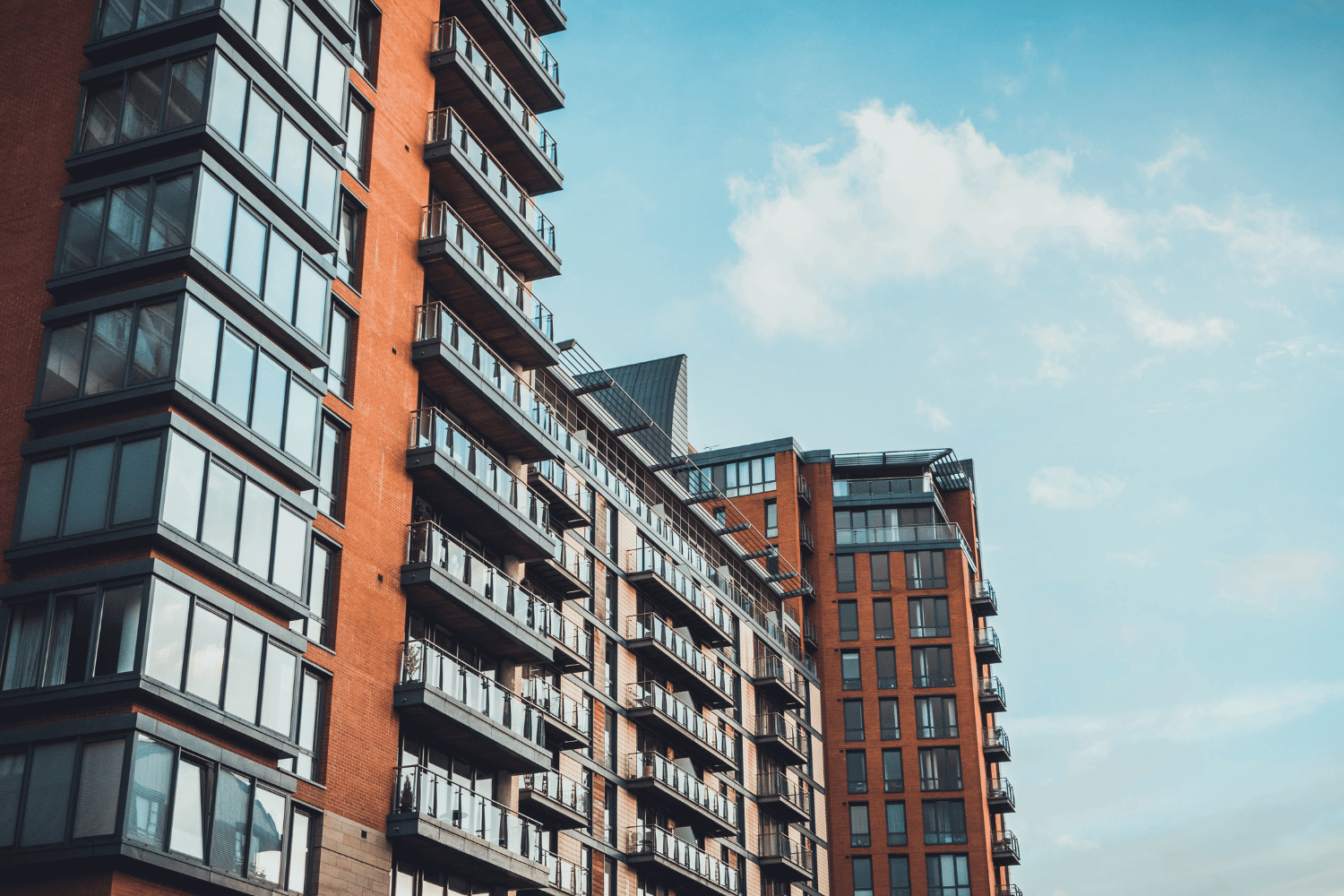 A modern apartment complex showcasing energy efficient windows.