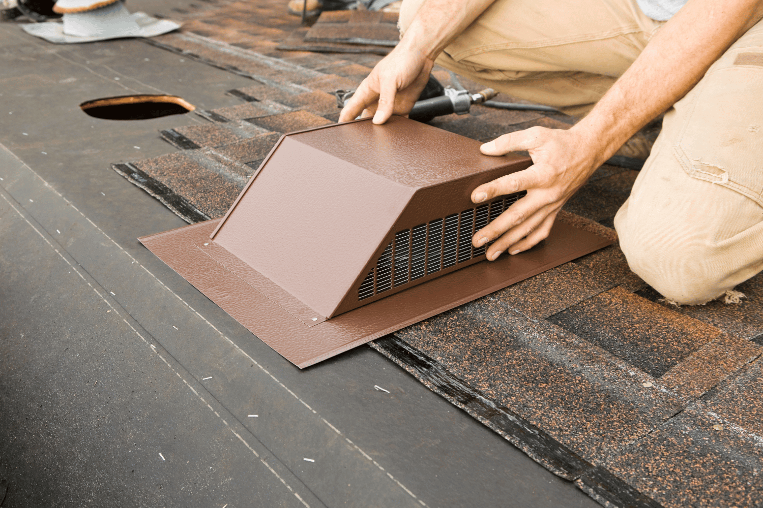 An illustration showing different types of roof vents including ridge vents and static vents.