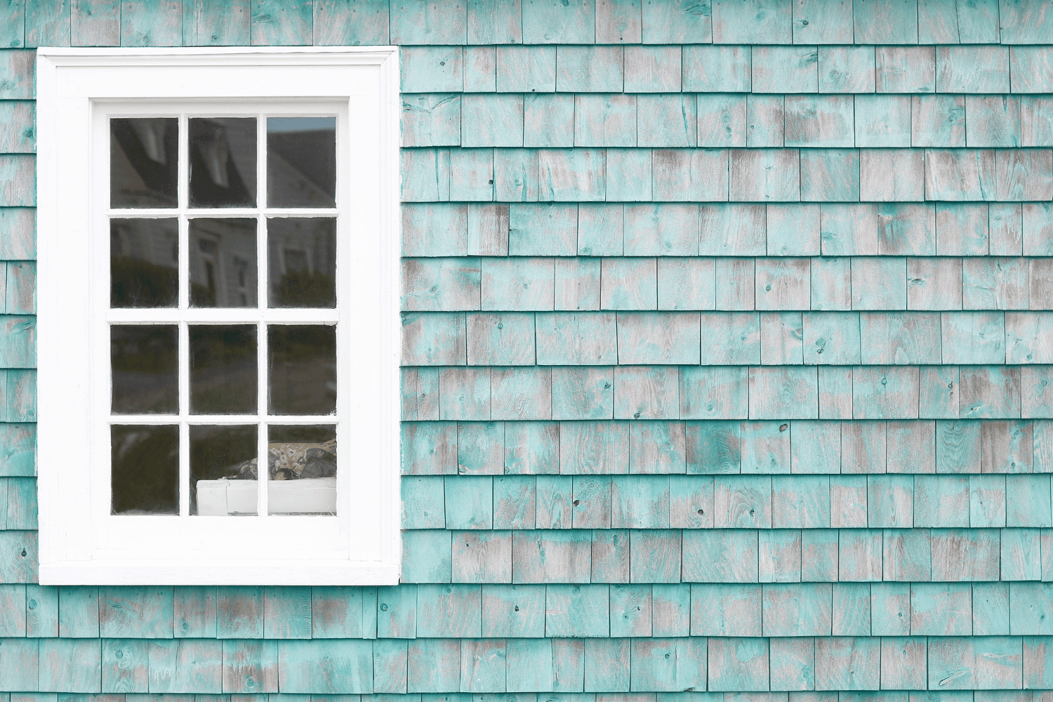 Aesthetic appeal of wood and vinyl siding. 