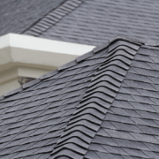 An illustration displaying different types of asphalt shingles, including 3-tab and architectural shingles.