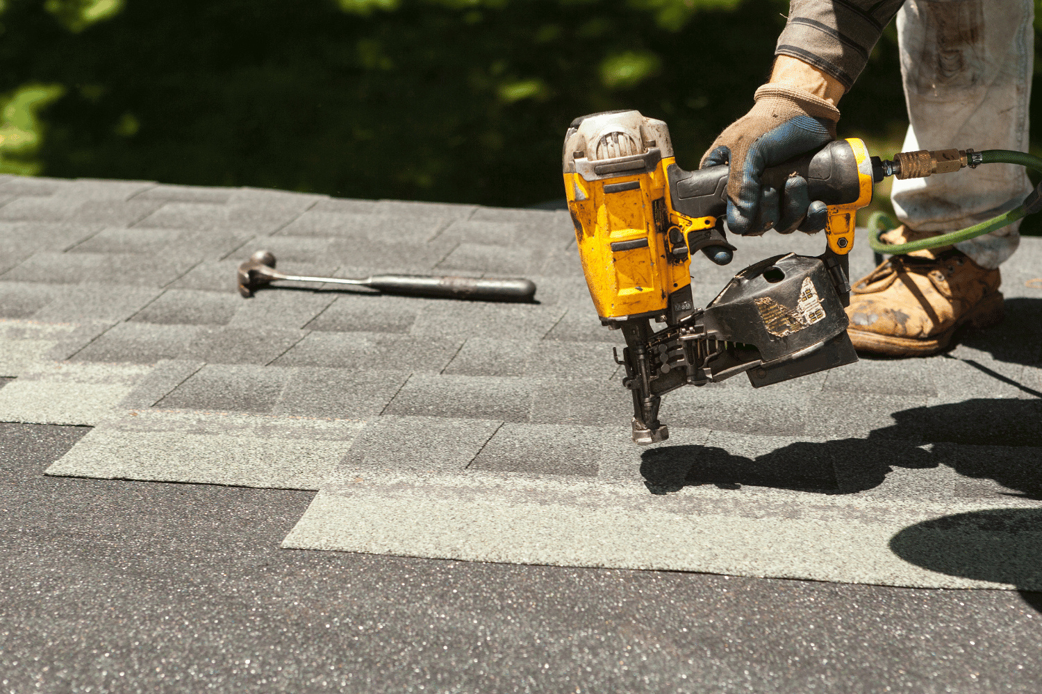 An illustration showing the core components of asphalt shingles, including layers and materials. 