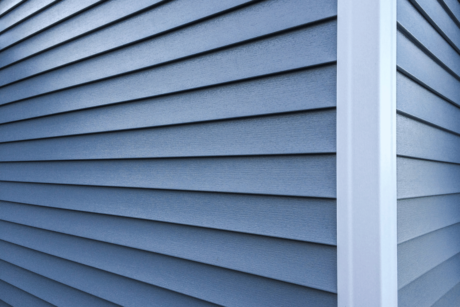 Cost comparison illustration showing wood siding vs vinyl siding. 