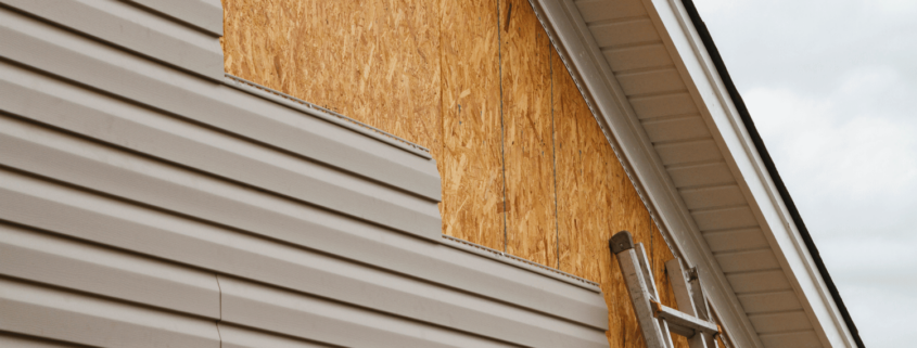 Environmental impact illustration of wood vs vinyl siding.