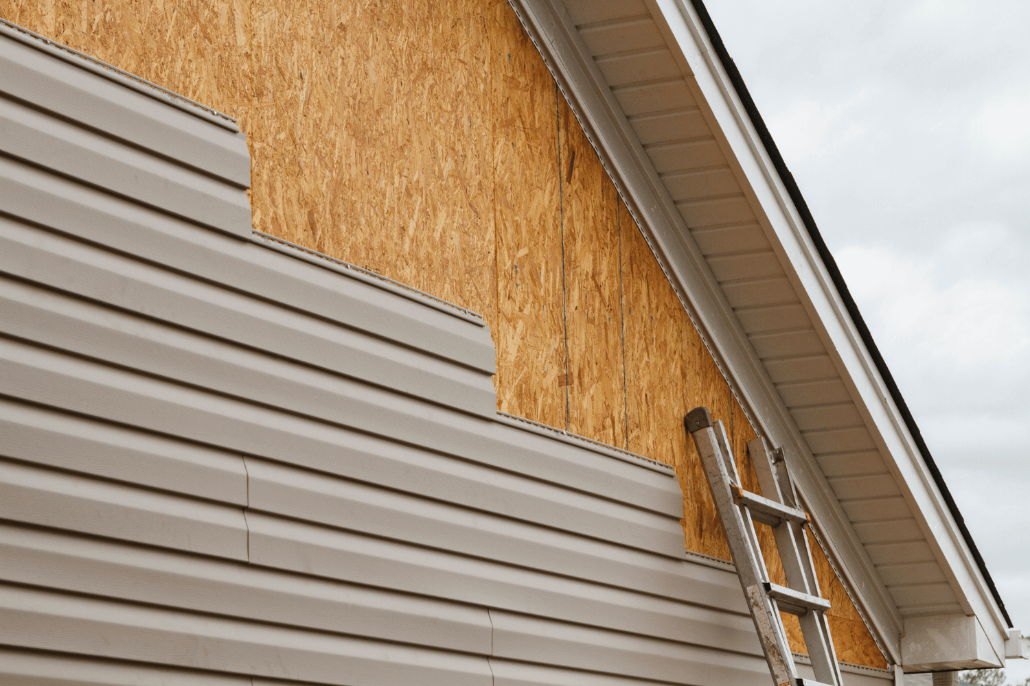 Environmental impact illustration of wood vs vinyl siding.