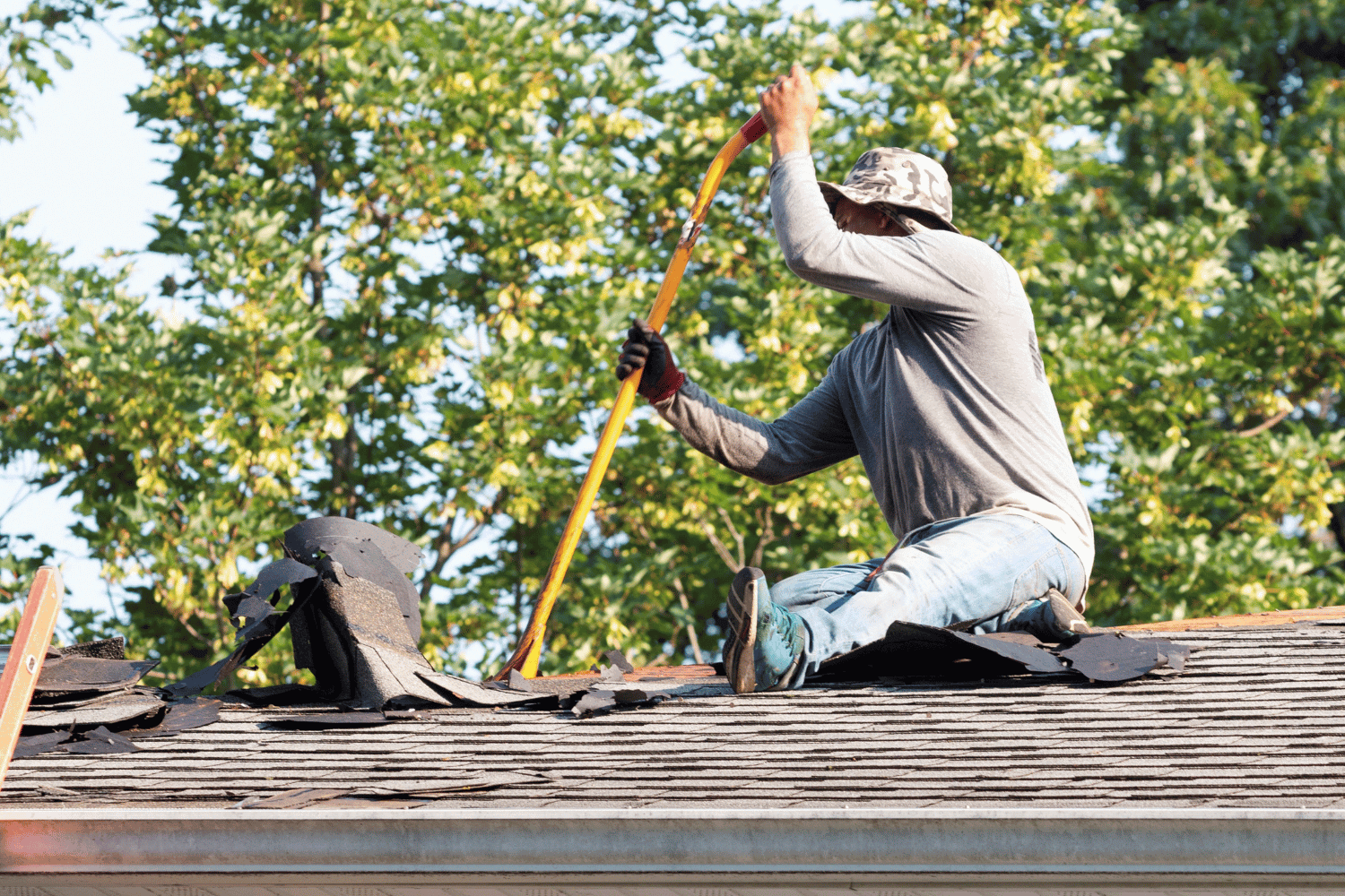 A visual guide to the step-by-step shingle removal process on a roof. 