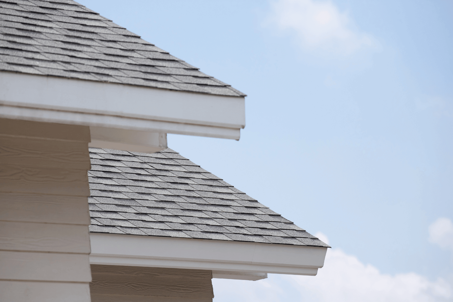 An illustration showing various roofing materials including 3 tab shingles.