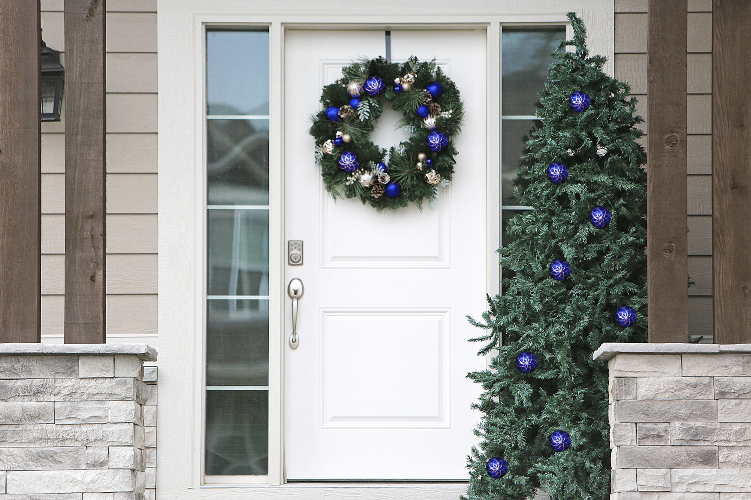 A professional technician assessing a front door for repair. 