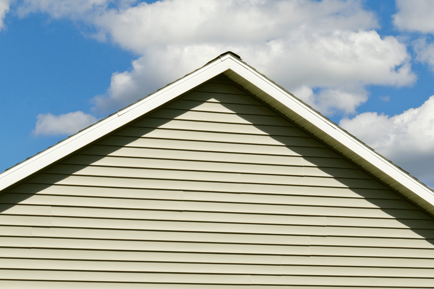 A visually appealing home exterior that showcases different siding styles and colors. 