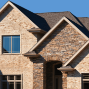 Architectural styles featuring gable roofs, including Craftsman and Tudor styles.