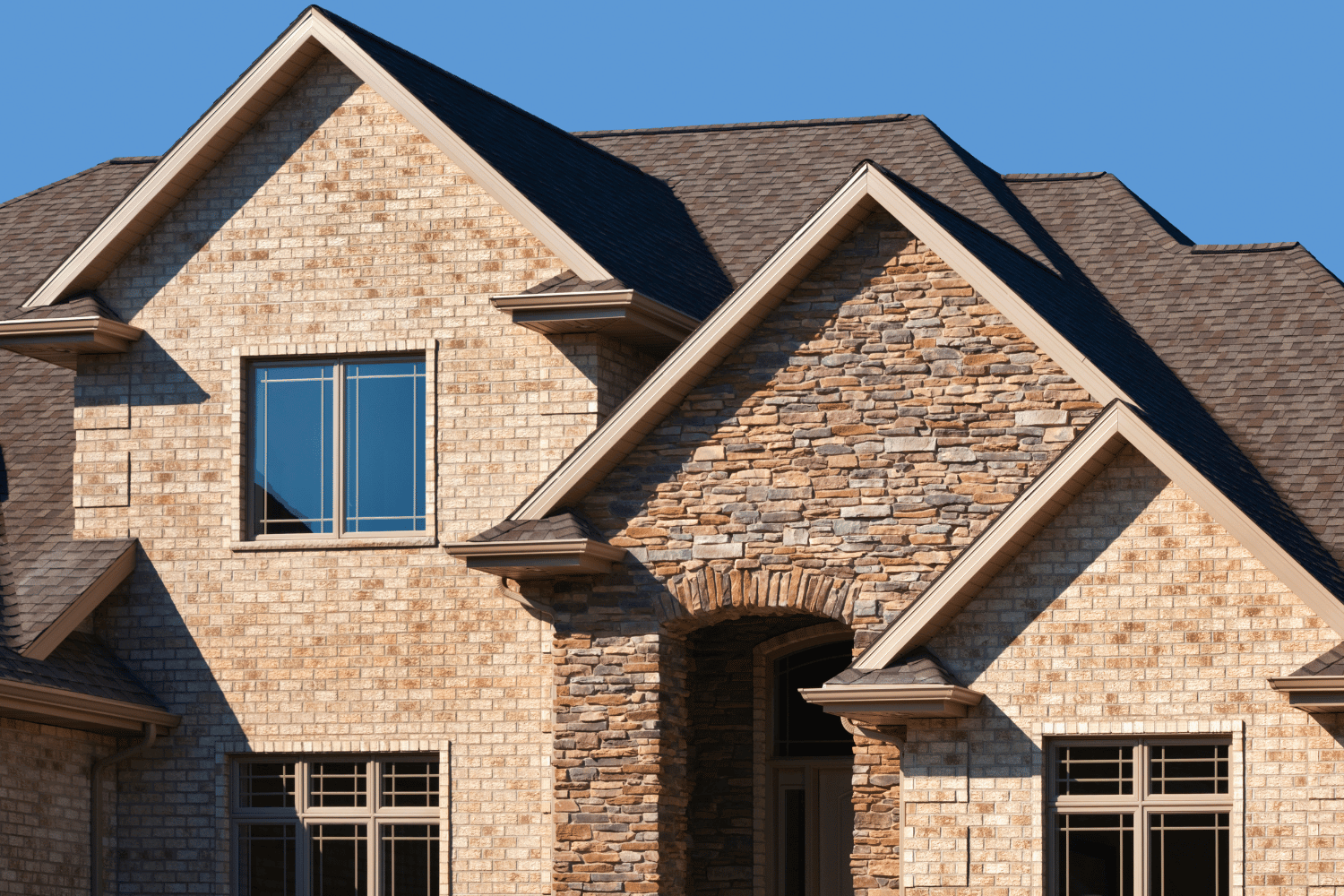 Architectural styles featuring gable roofs, including Craftsman and Tudor styles. 