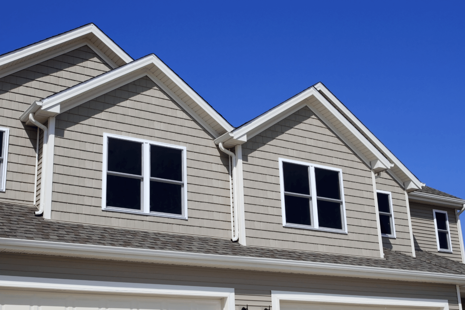 The benefits of selecting the right roof shingle color for your home. 