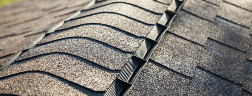 Before and after images of a roof treated with shingle sealant.