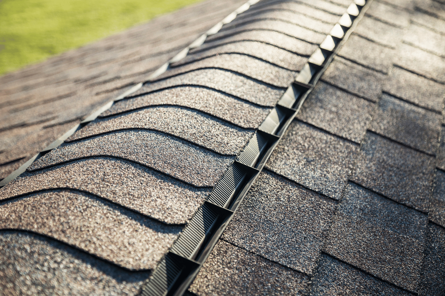 Before and after images of a roof treated with shingle sealant. 