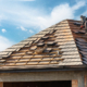 process of building, roofer workers installing grey metal tile on top of roof with wooden frame outdoors on blue sky background