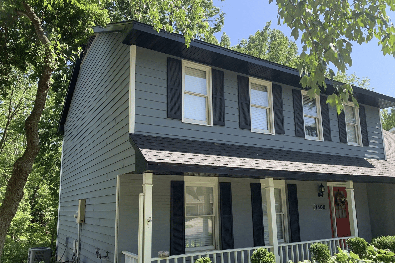 Seamless Black Gutters with Hidden Fasteners After