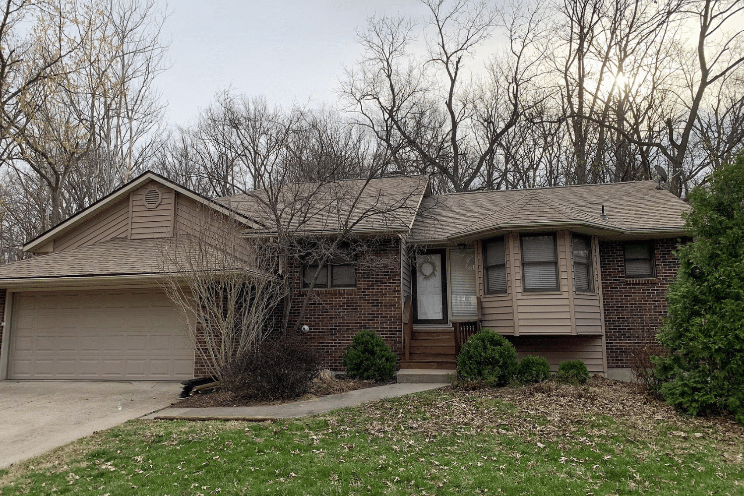 Shingle Roof Replacement and Gutter Installation After