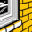 Close technical view of a residential window frame, sash, sill, seal, and surrounding masonry