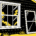 Flat illustration of a primary window with a separate storm panel leaning beside the opening.
